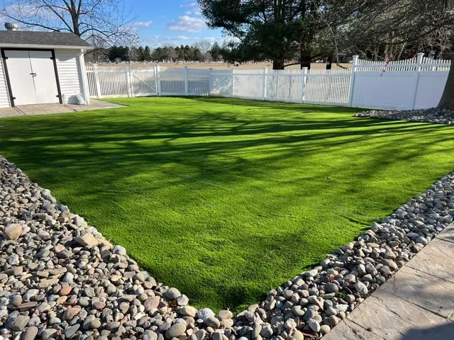 Artificial turf installed along a side yard